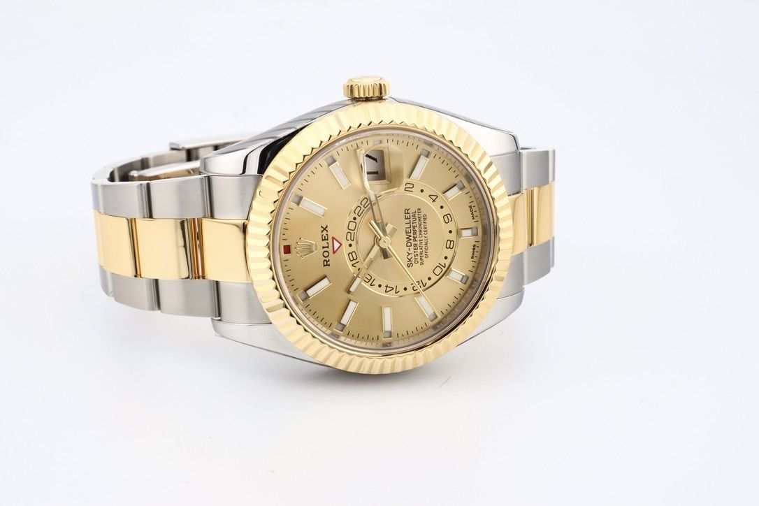 Rolex sky dweller discount yellow gold champagne dial